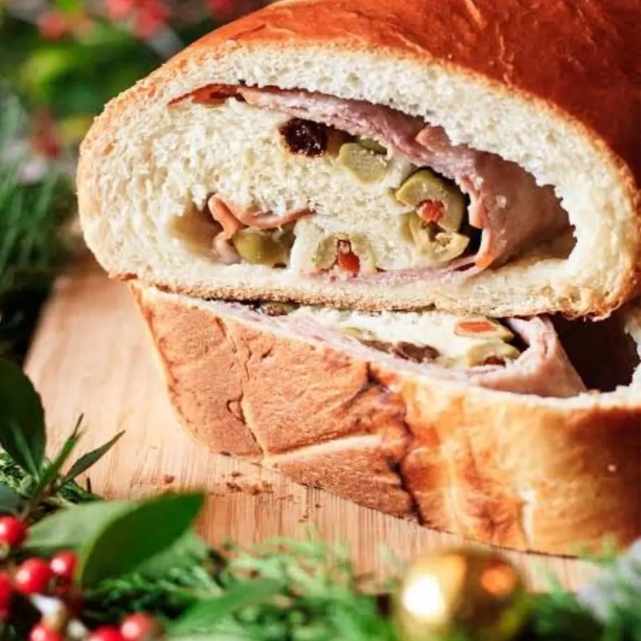 A bread filled with meat and vegetables